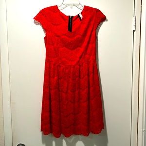 Red lace Kensie dress, see thru at hem, and sleeves, size small